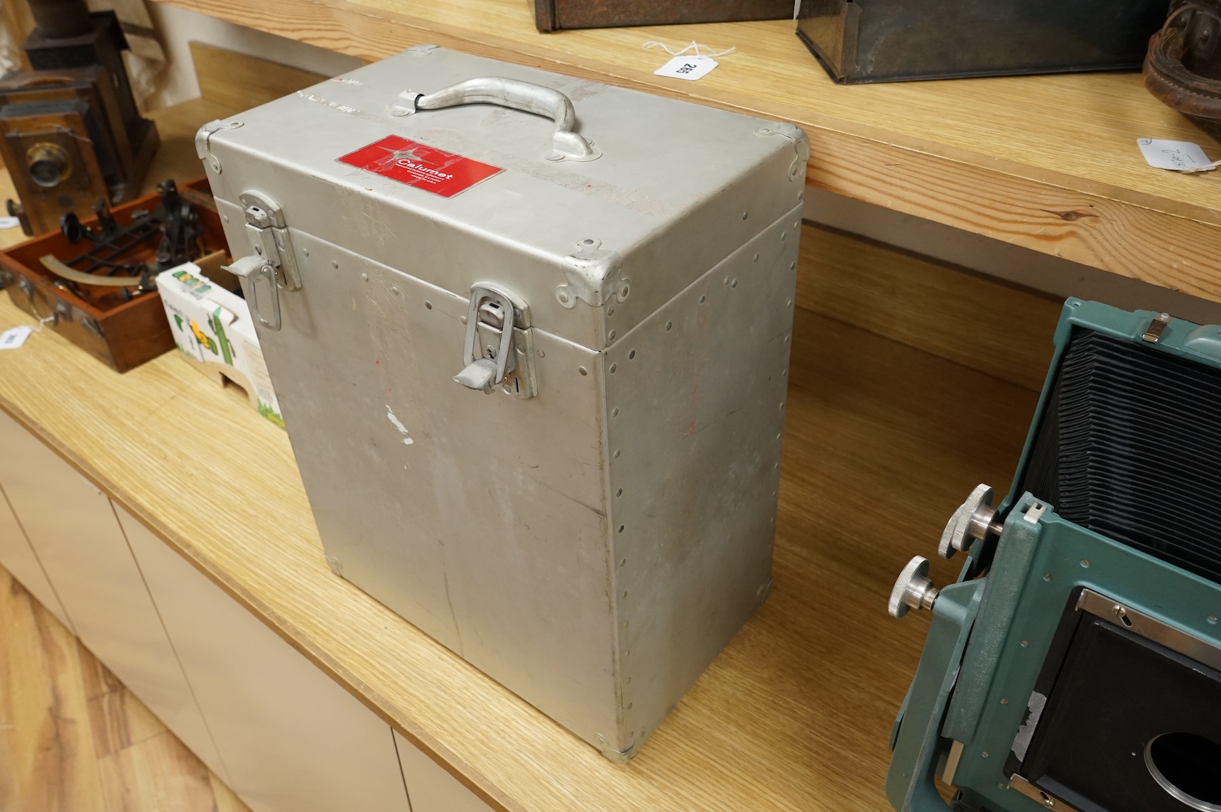 A Calumet C1, 1950s 10 x8 studio camera in its original flight case with applied label reading; ‘Calumet Manufacturing Company, Chicago, Illinois, Made in U.S.A.’